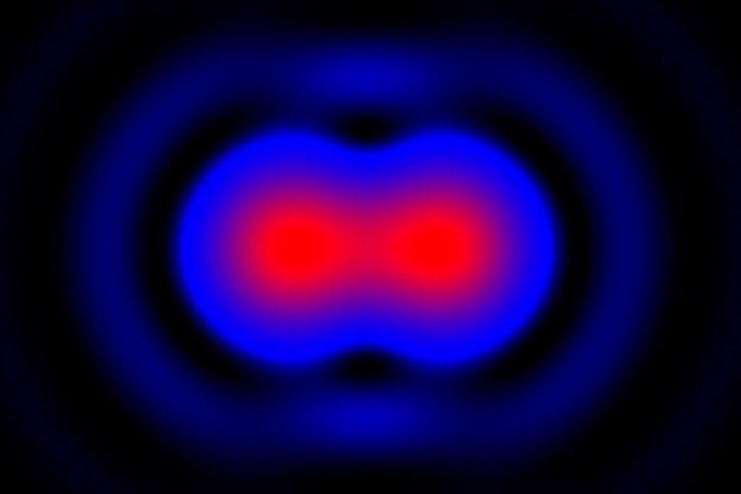 Intensity distribution (arbitrary color coding) of an image of two points where the distance between them corresponds to the Rayleigh criterion. Intensity_distribution_Rayleigh_criterion.jpg