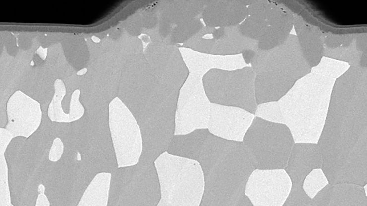 Ion beam milling of solder bump with the EM TIC 3X. The results show a smooth surface and easily recognizable structural details.