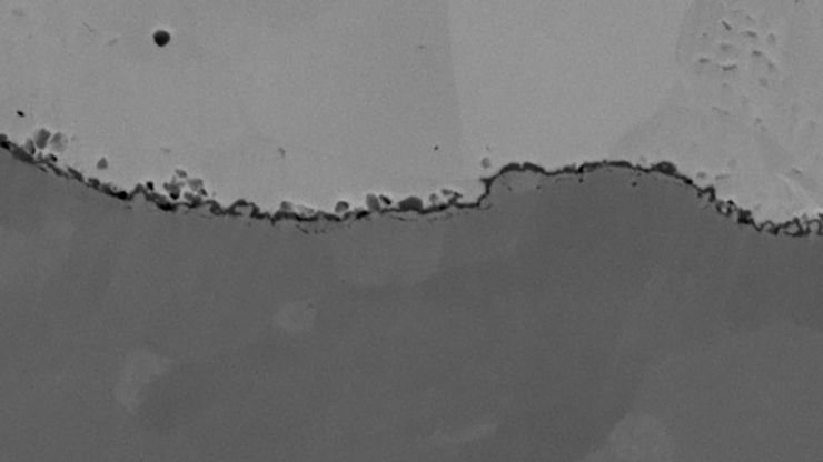 Ion milling of Zinc on Steel prepared with the EM TIC 3X shows a cleanly etched surface.