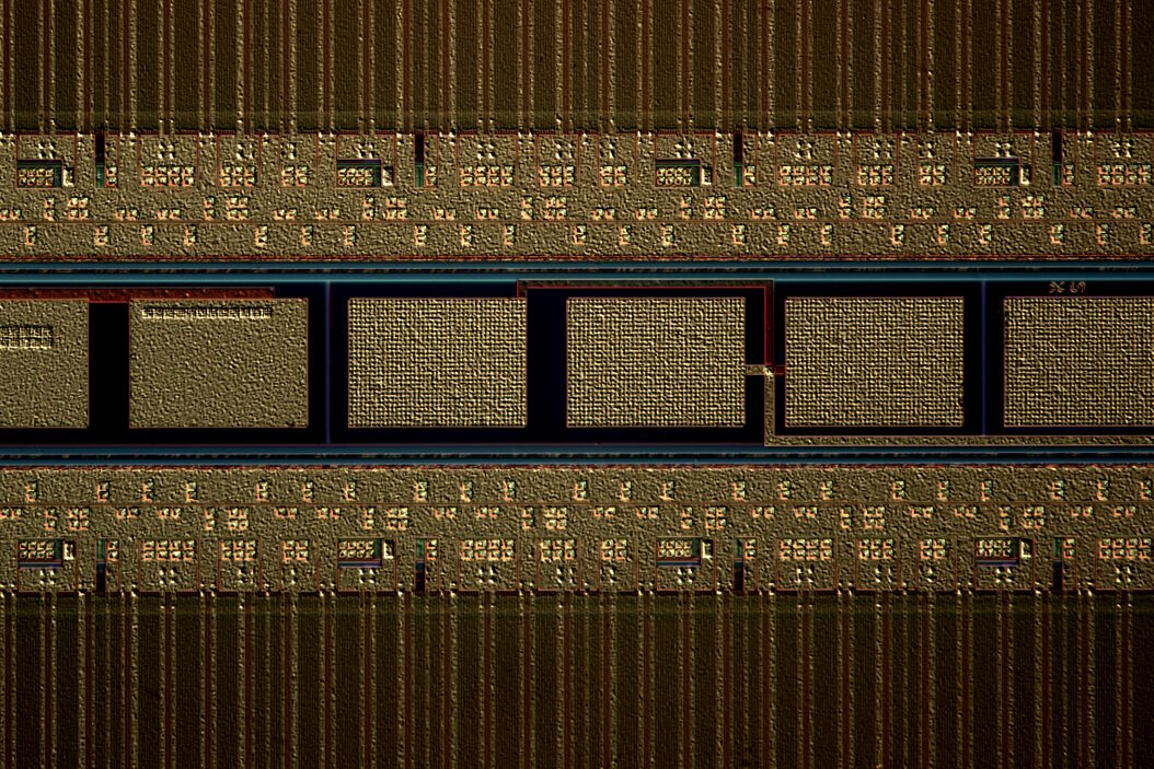 Region of a patterned wafer inspected using optical microscopy and automated and reproducible DIC (differential interference contrast). With DIC users are able to visualize small height differences on the wafer surface more easily. Patterned_wafer_inspected_by_automated_and_reproducible_DIC.jpg