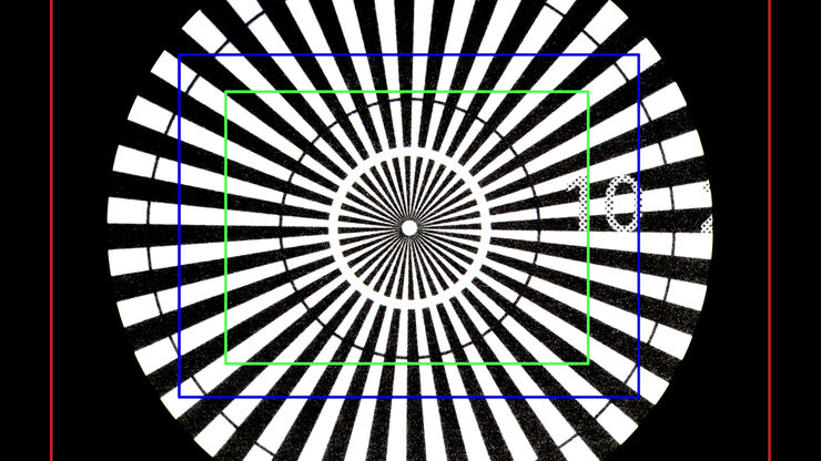 Image of a Siemens star, where the diameter of the 1st black line circle is 10 mm and the 2nd is 20 mm, taken via an eyepiece of a M205 A stereo microscope. The rectangles represent the field of view (FOV) of a Leica digital camera when installed with various C-mounts (red 0.32x, blue 0.5x, green 0.63x).