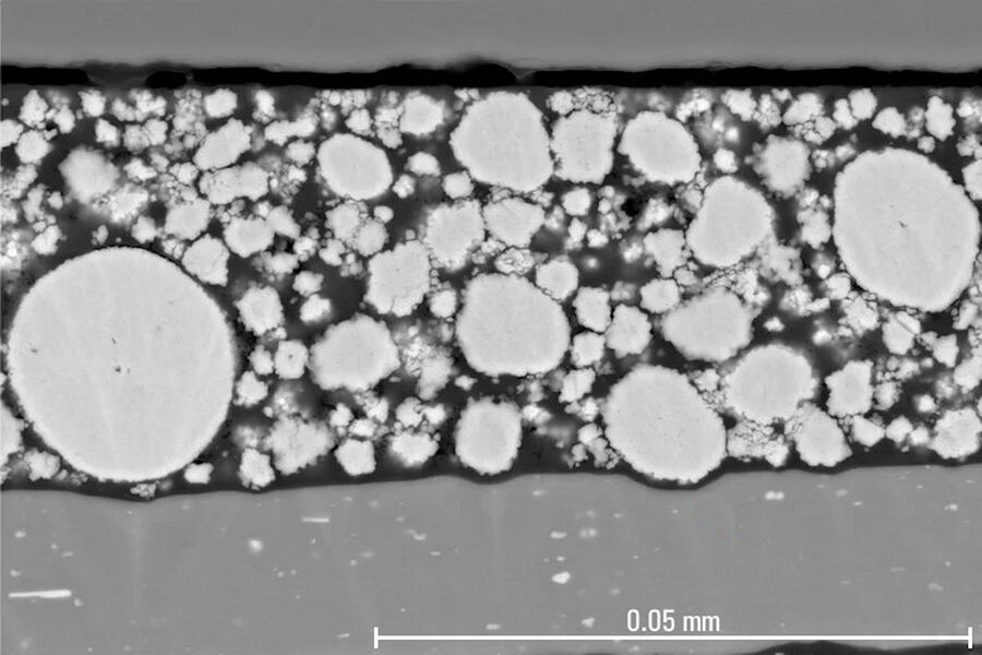 [Translate to japanese:] Internal structure of a lithium-nickel-manganese-cobalt oxide/aluminum (Li-NMC/Al) electrode which is used in battery systems. Image of a cross section prepared with the EM TXP and EM TIC 3X systems.