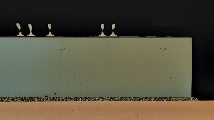 Image of an integrated-circuit (IC) chip cross section acquired at higher magnification showing a region of interest.