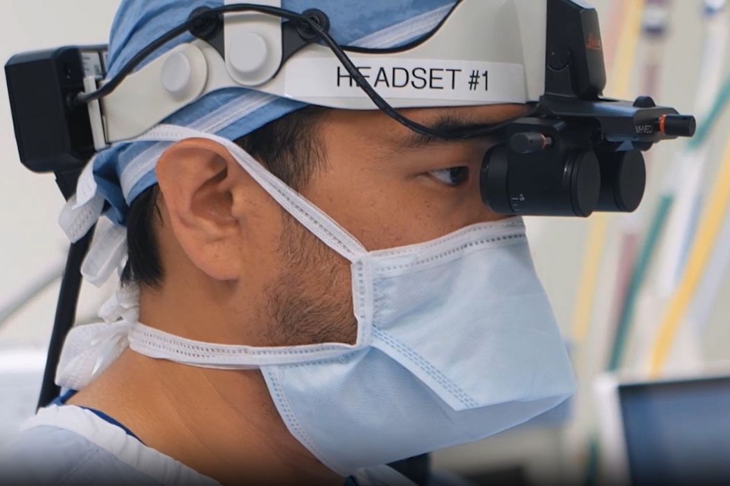 Dr. Andrew Huang, Baylor College of Medicine, in the operating room (OR) performing ear, nose and throat (ENT) surgery using the MyVeo surgical visualization headset. Dr_Andrew_Huang_using_MyVeo.jpg